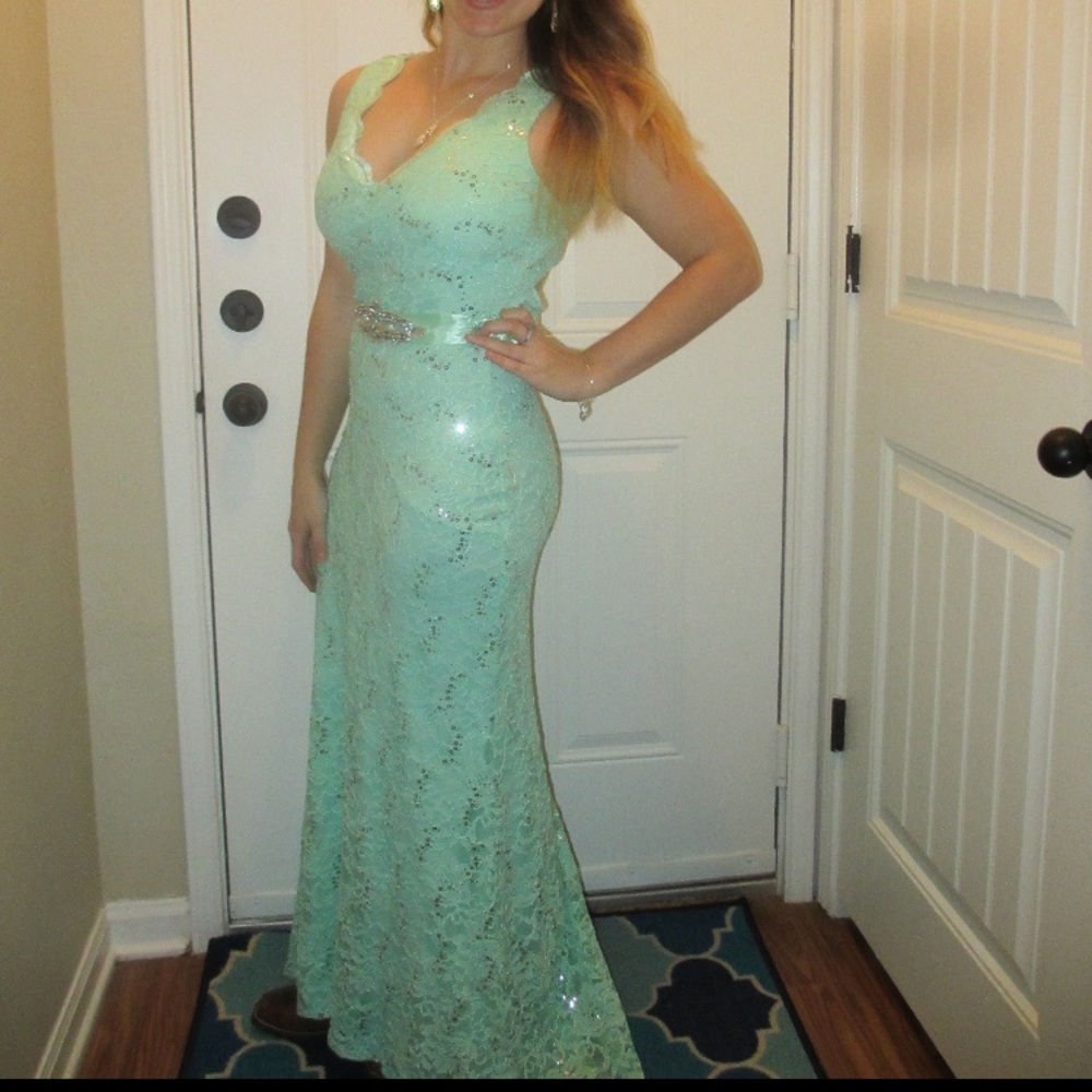 Beautiful formal sea foam green dress with train
